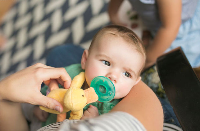 Baby with WubbaNub