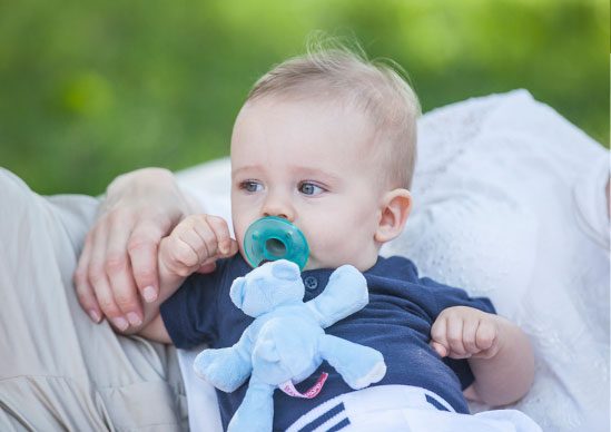 Baby with WubbaNub