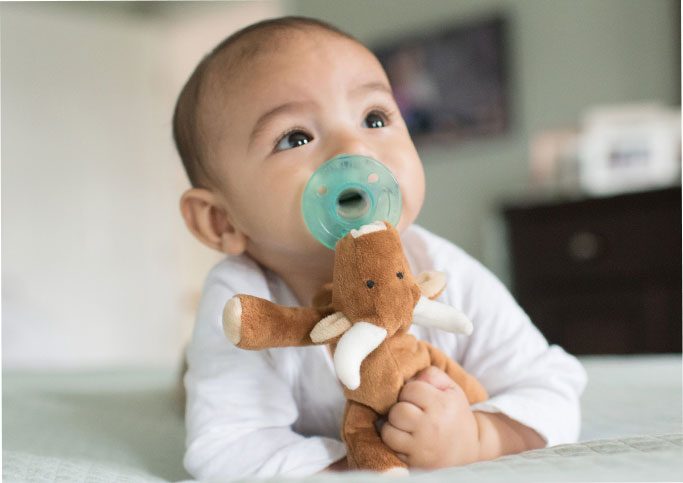 Baby with WubbaNub